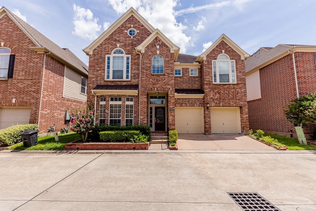 3531 Urban Woods Trl, Houston, TX 77008 - view of front of house with brick siding, driveway, and a garage