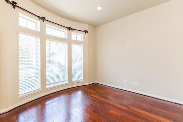 3531 Urban Woods Trl, Houston, TX 77008 - empty room with dark wood-type flooring and recessed lighting