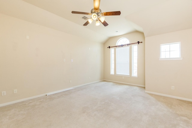 3531 Urban Woods Trl, Houston, TX 77008 - unfurnished room with healthy amount of natural light, lofted ceiling, ceiling fan, and light colored carpet