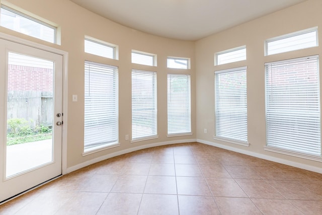 3531 Urban Woods Trl, Houston, TX 77008 - unfurnished sunroom featuring tile patterned flooring and baseboards