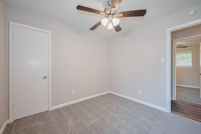 9003 Chateau Forest Dr, Houston, TX 77088 - carpeted spare room with ceiling fan, baseboards, and a smoke detector