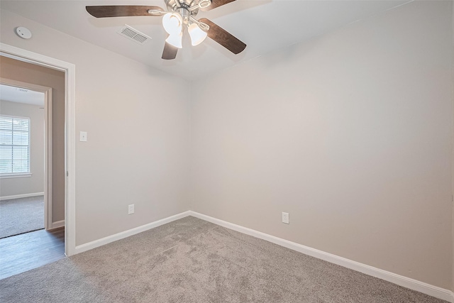 9003 Chateau Forest Dr, Houston, TX 77088 - carpeted empty room with a ceiling fan and baseboards