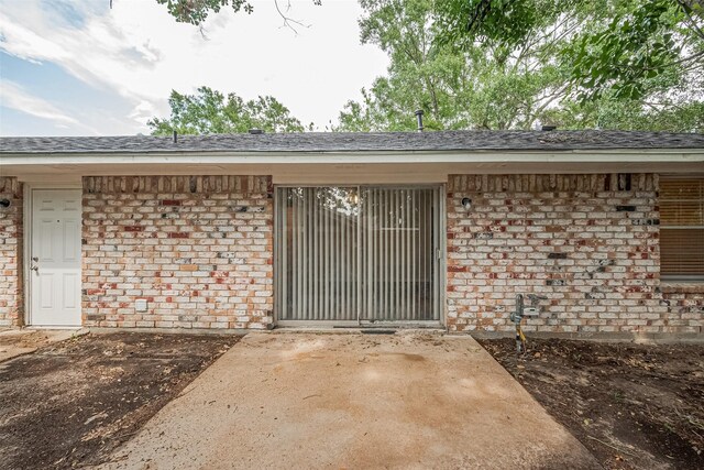 9003 Chateau Forest Dr, Houston, TX 77088 - property entrance featuring brick siding
