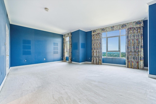 1000 Uptown Park Blvd Unit 181, Houston, TX 77056 - unfurnished room with crown molding, baseboards, a smoke detector, and carpet floors