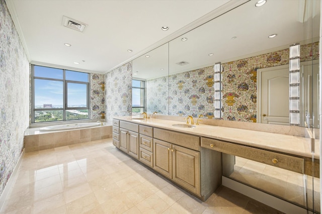 1000 Uptown Park Blvd Unit 181, Houston, TX 77056 - bathroom featuring healthy amount of natural light, a bath, double vanity, wallpapered walls, and recessed lighting