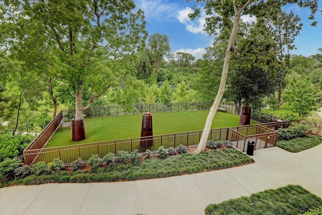 1000 Uptown Park Blvd Unit 181, Houston, TX 77056 - view of yard featuring a wooded view