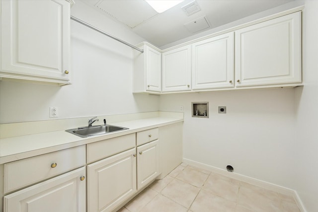 1000 Uptown Park Blvd Unit 181, Houston, TX 77056 - washroom with hookup for an electric dryer, hookup for a washing machine, cabinet space, baseboards, and light tile patterned flooring