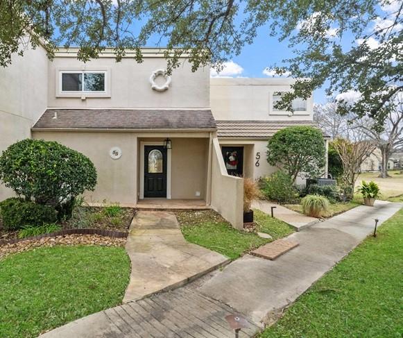 55 April Hl, Montgomery, TX 77356 - multi unit property with stucco siding and a front lawn