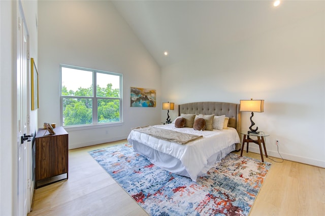 2310 Reinerman St, Houston, TX 77007 - bedroom featuring wood finished floors, baseboards, high vaulted ceiling, and recessed lighting