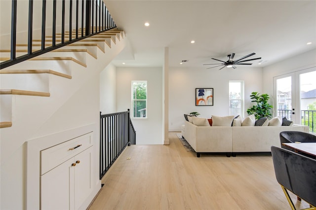 2310 Reinerman St, Houston, TX 77007 - living area with light wood finished floors, recessed lighting, and ceiling fan