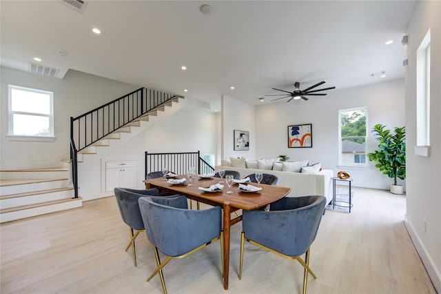 2310 Reinerman St, Houston, TX 77007 - dining space with light wood-style floors, recessed lighting, a ceiling fan, stairs, and baseboards