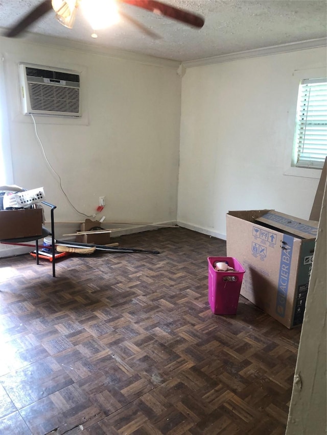 409 7th St, Huntsville, TX 77320 - interior space with ornamental molding, a ceiling fan, and a wall unit AC