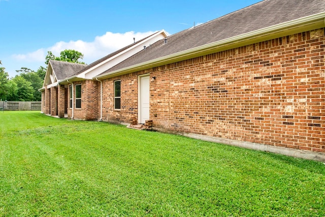 12406 Fort Isabella Ct, Tomball, TX 77375 - view of home's exterior with brick siding and a shingled roof