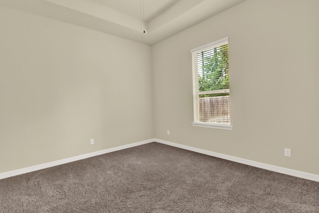 12406 Fort Isabella Ct, Tomball, TX 77375 - empty room featuring dark carpet and baseboards