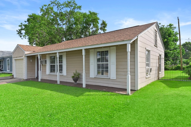1900 Oregon St, Baytown, TX 77520 - ranch-style home featuring a garage, a shingled roof, and cooling unit