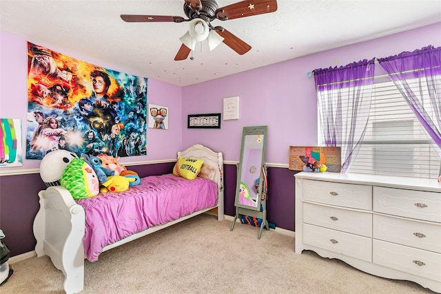 2907 Silverberry Trl, Houston, TX 77345 - bedroom featuring light colored carpet, a ceiling fan, and baseboards