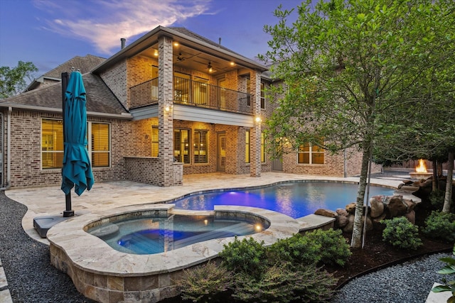 12710 Pebblebrook Dr, Houston, TX 77024 - view of pool featuring a patio area, a ceiling fan, and a pool with connected hot tub