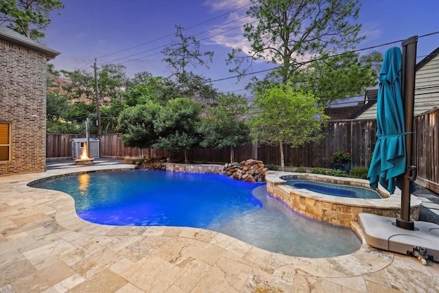 12710 Pebblebrook Dr, Houston, TX 77024 - view of pool featuring a fenced backyard, a pool with connected hot tub, and a patio