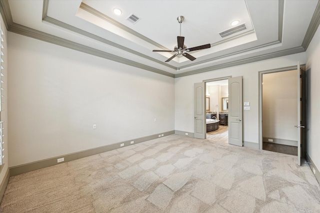 12710 Pebblebrook Dr, Houston, TX 77024 - unfurnished bedroom with crown molding, a raised ceiling, light carpet, baseboards, and ceiling fan