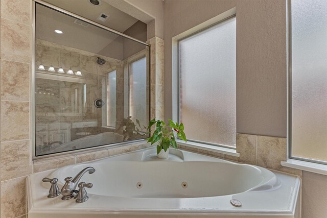 25322 Metzler Creek Dr, Spring, TX 77389 - full bathroom featuring a whirlpool tub