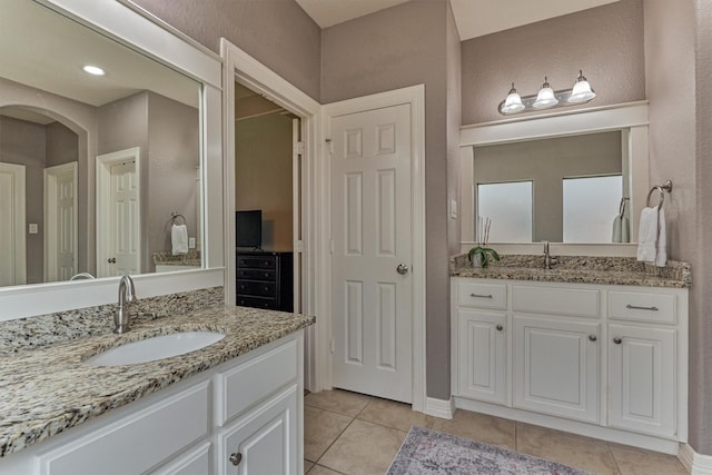 25322 Metzler Creek Dr, Spring, TX 77389 - bathroom featuring tile patterned floors and two vanities