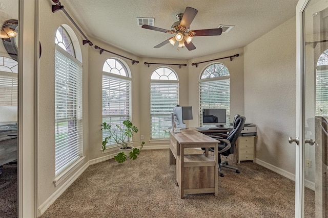 25322 Metzler Creek Dr, Spring, TX 77389 - carpeted office space with ceiling fan, a textured ceiling, a textured wall, french doors, and baseboards