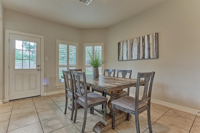 25322 Metzler Creek Dr, Spring, TX 77389 - dining space with light tile patterned floors and baseboards
