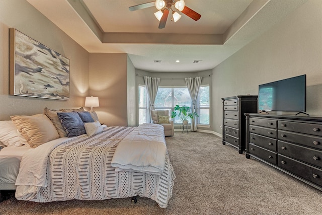 25322 Metzler Creek Dr, Spring, TX 77389 - bedroom with carpet floors, a tray ceiling, ceiling fan, and baseboards