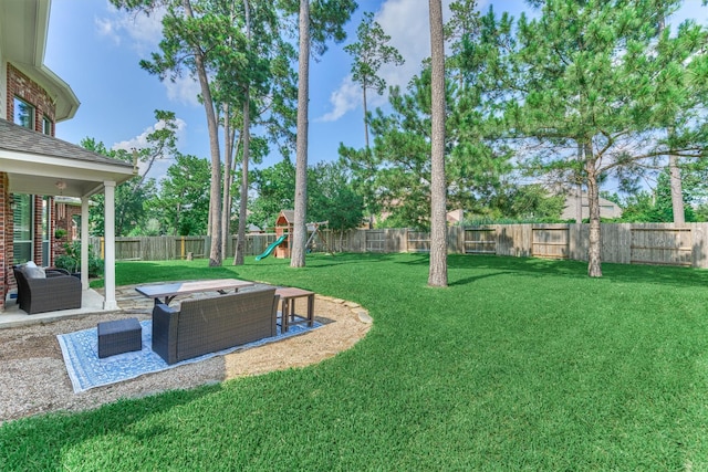 25322 Metzler Creek Dr, Spring, TX 77389 - view of yard featuring a patio and a playground