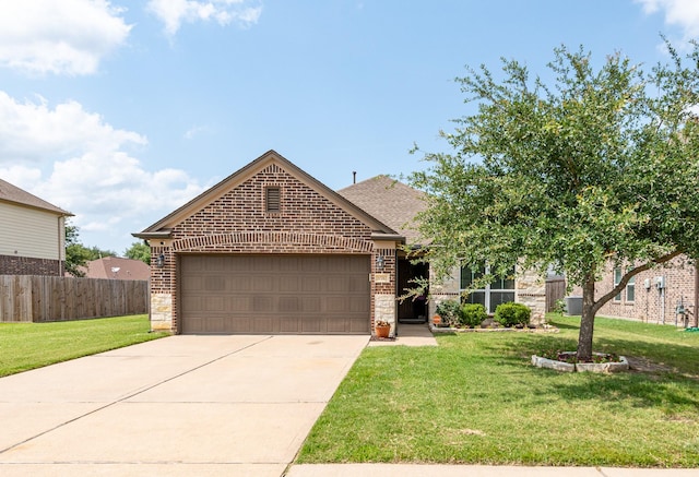 10742 Chestnut Path Way, Tomball, TX 77375 - view of front of house featuring brick siding, a garage, driveway, and a shingled roof