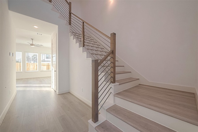 8918 Grovner Pl, Houston, TX 77055 - stairs with wood finished floors, baseboards, a ceiling fan, and recessed lighting