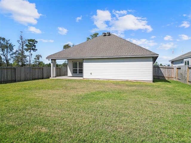 204 Shoreview Dr, Conroe, TX 77303 - rear view of house featuring a patio area and roof with shingles