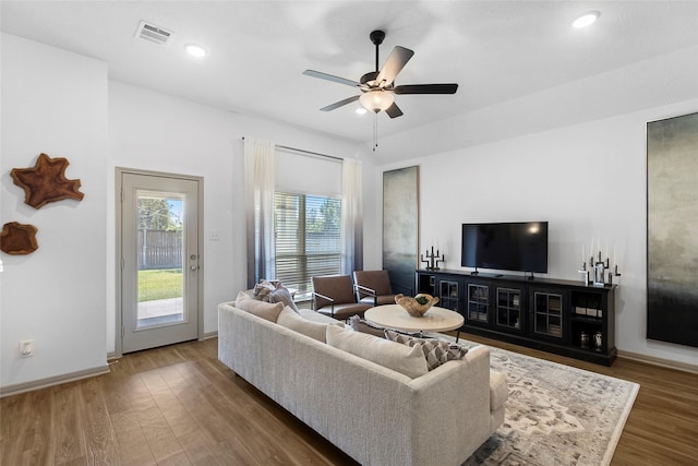 204 Shoreview Dr, Conroe, TX 77303 - living room with wood finished floors, ceiling fan, baseboards, and recessed lighting