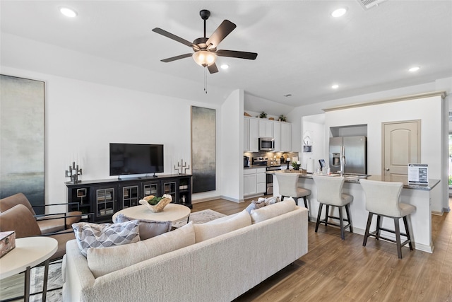 204 Shoreview Dr, Conroe, TX 77303 - living area with a ceiling fan, light wood-type flooring, recessed lighting, and baseboards