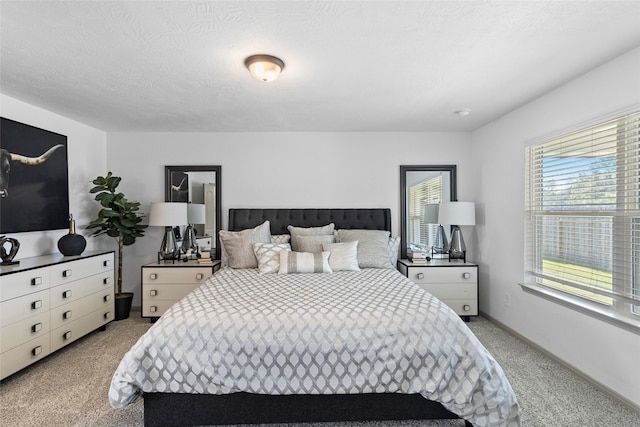 204 Shoreview Dr, Conroe, TX 77303 - bedroom with light carpet and baseboards