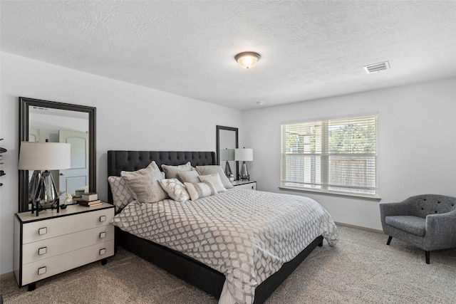 204 Shoreview Dr, Conroe, TX 77303 - bedroom featuring carpet, a textured ceiling, and baseboards