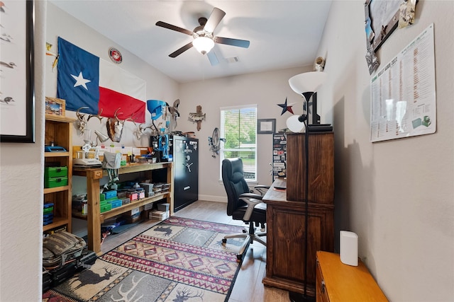 28026 Chuckwagon Trl, Magnolia, TX 77355 - office space featuring wood finished floors and a ceiling fan