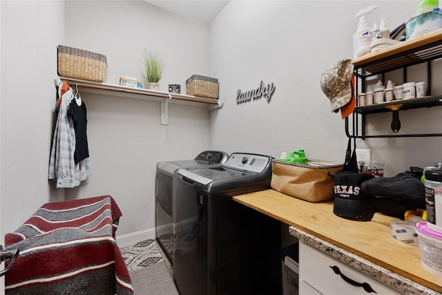 28026 Chuckwagon Trl, Magnolia, TX 77355 - washroom featuring washing machine and dryer and baseboards