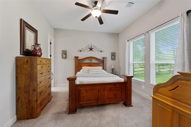 28026 Chuckwagon Trl, Magnolia, TX 77355 - bedroom featuring light carpet, baseboards, and ceiling fan