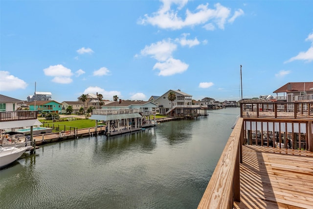 1427 Bamboo Dr, Tiki Island, TX 77554 - dock area with a water view and a residential view