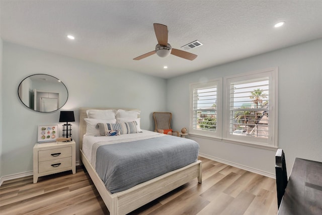 1427 Bamboo Dr, Tiki Island, TX 77554 - bedroom featuring light wood-style floors, recessed lighting, ceiling fan, and baseboards