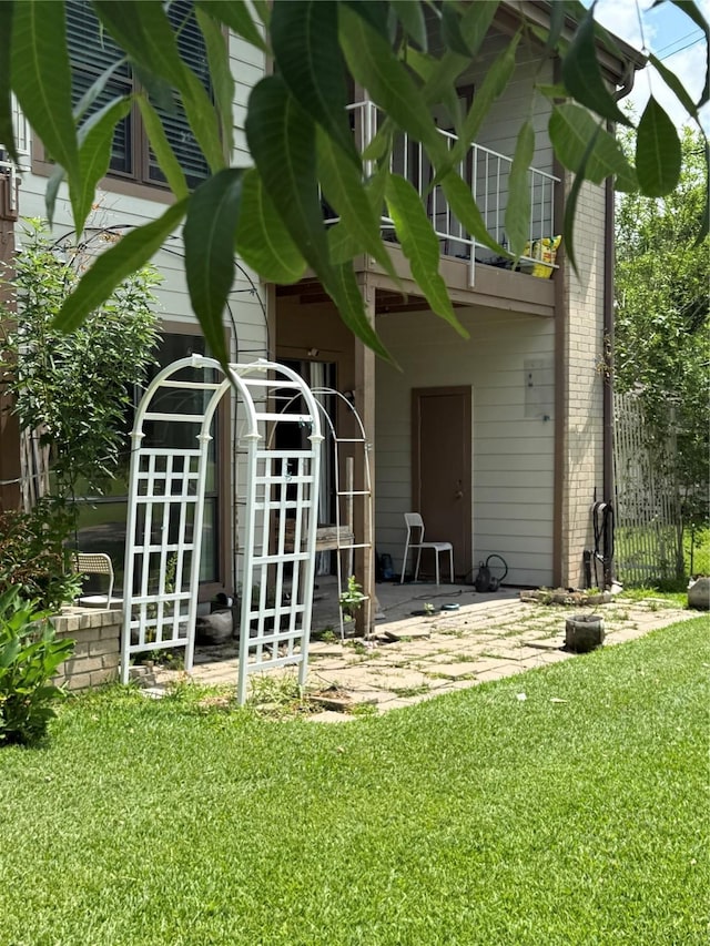 8149 Sands Point Dr Unit 113, Houston, TX 77036 - doorway to property with a balcony and a patio