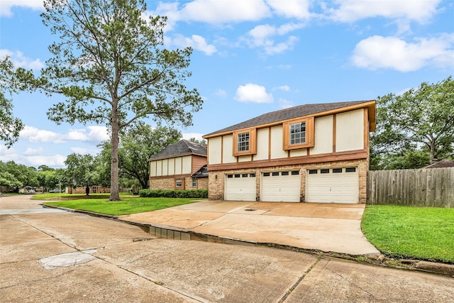 4923 Bradstone Ct, Houston, TX 77084 - english style home featuring brick siding, concrete driveway, an attached garage, roof with shingles, and stucco siding