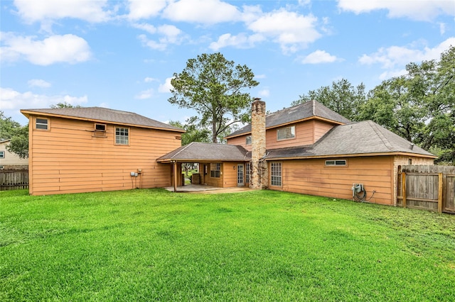 4923 Bradstone Ct, Houston, TX 77084 - back of property featuring a patio area and a chimney