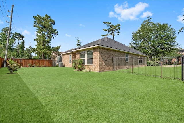 7 Fraiser Fir Pl, Spring, TX 77389 - view of yard with central air condition unit