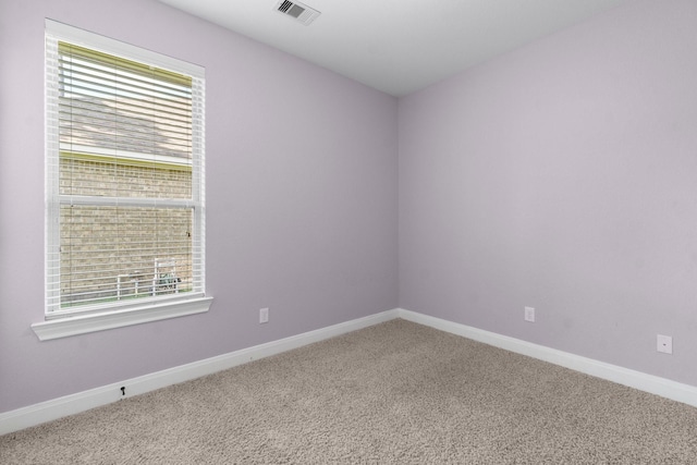 7 Fraiser Fir Pl, Spring, TX 77389 - carpeted spare room with plenty of natural light and baseboards