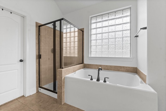 7 Fraiser Fir Pl, Spring, TX 77389 - bathroom featuring a stall shower, tile patterned flooring, and a bath