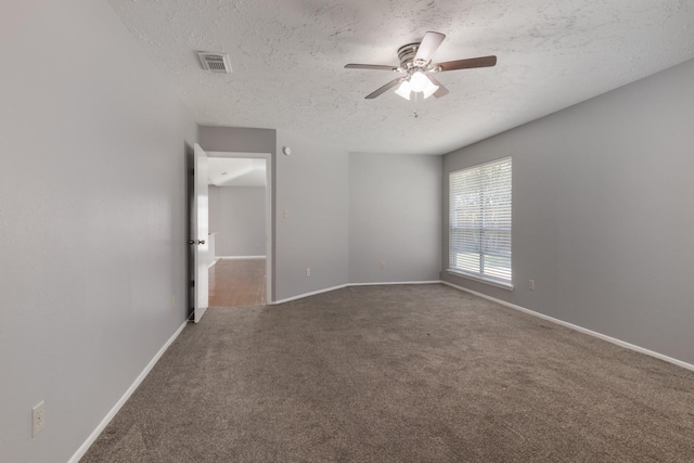 13402 Piney Oaks Dr, Houston, TX 77065 - empty room featuring carpet flooring, a ceiling fan, a textured ceiling, and baseboards