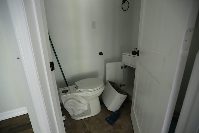 5952 Moonstone St, Port Arthur, TX 77640 - bathroom featuring toilet and unfinished concrete flooring