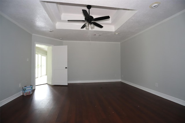 5952 Moonstone St, Port Arthur, TX 77640 - unfurnished room with hardwood / wood-style floors, a raised ceiling, ceiling fan, baseboards, and a textured ceiling